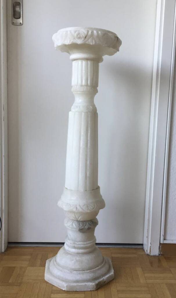 Carved marble pedestal