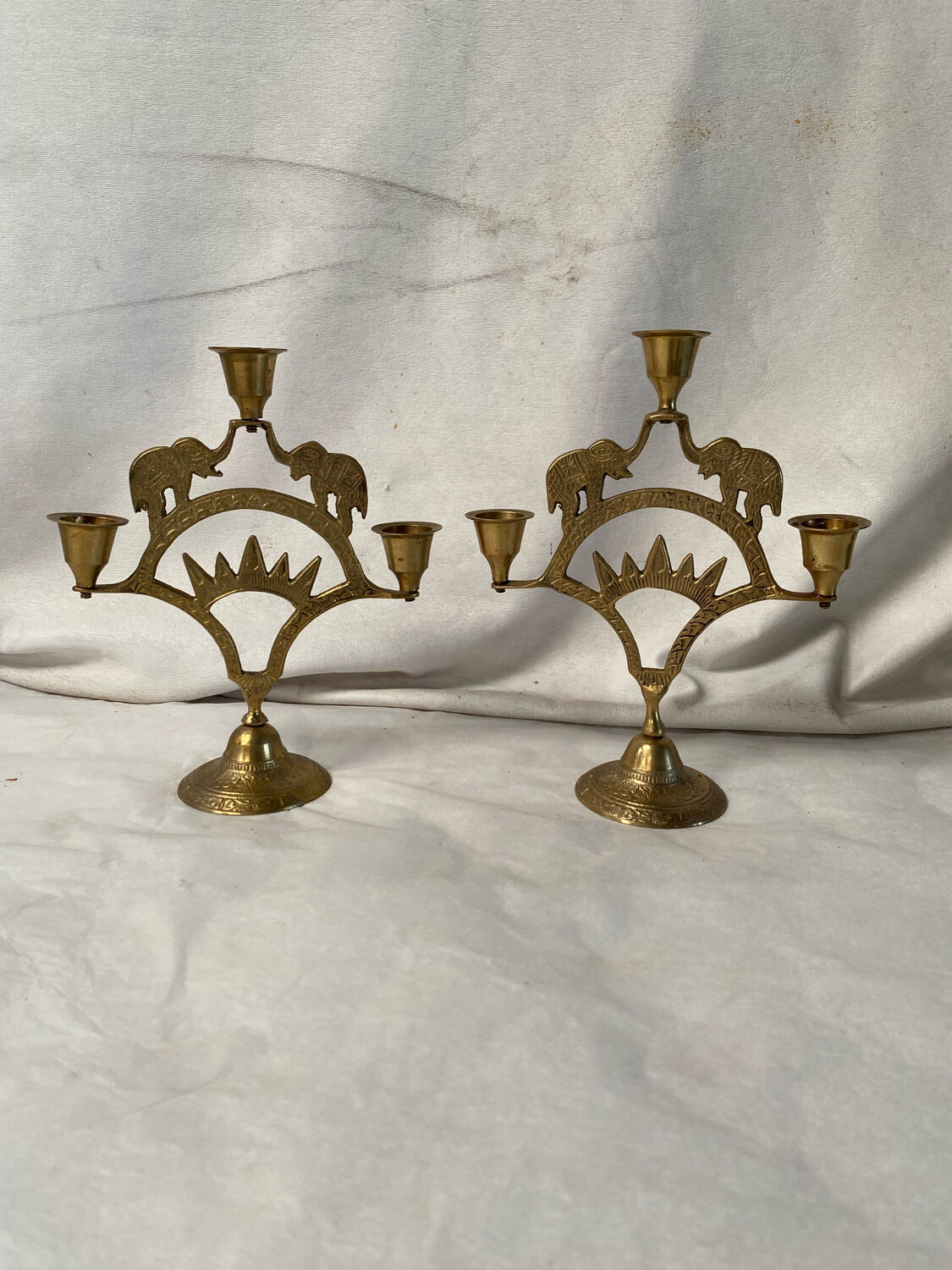 Pair of brass elephant candlesticks