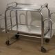 Vintage 1970s rolling dessert trolley in chrome metal and mirrored glass.