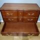Commode arbalète trois tiroirs en merisier