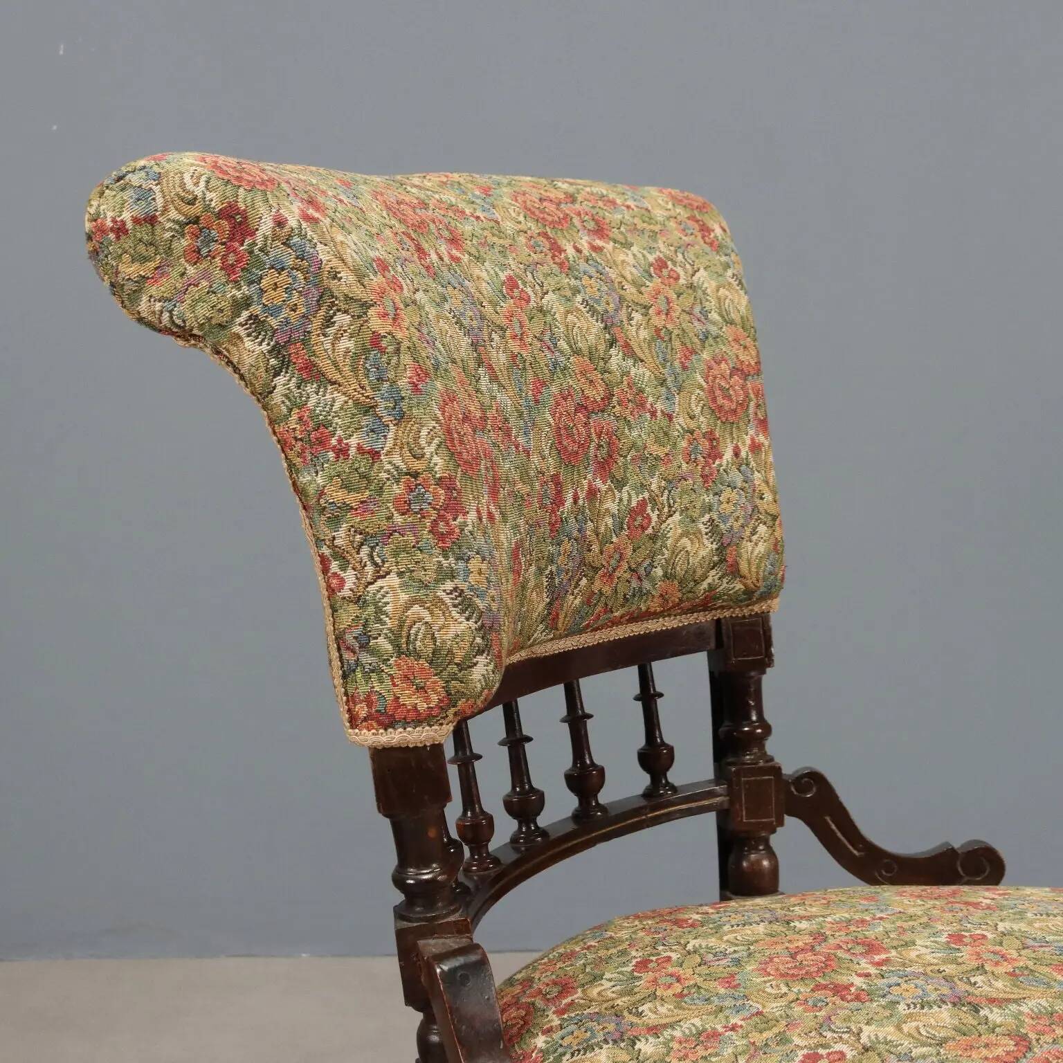 Victorian armchair with fabric pouf, England, 19th century.