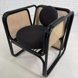 Cubic armchair in black rattan and canework