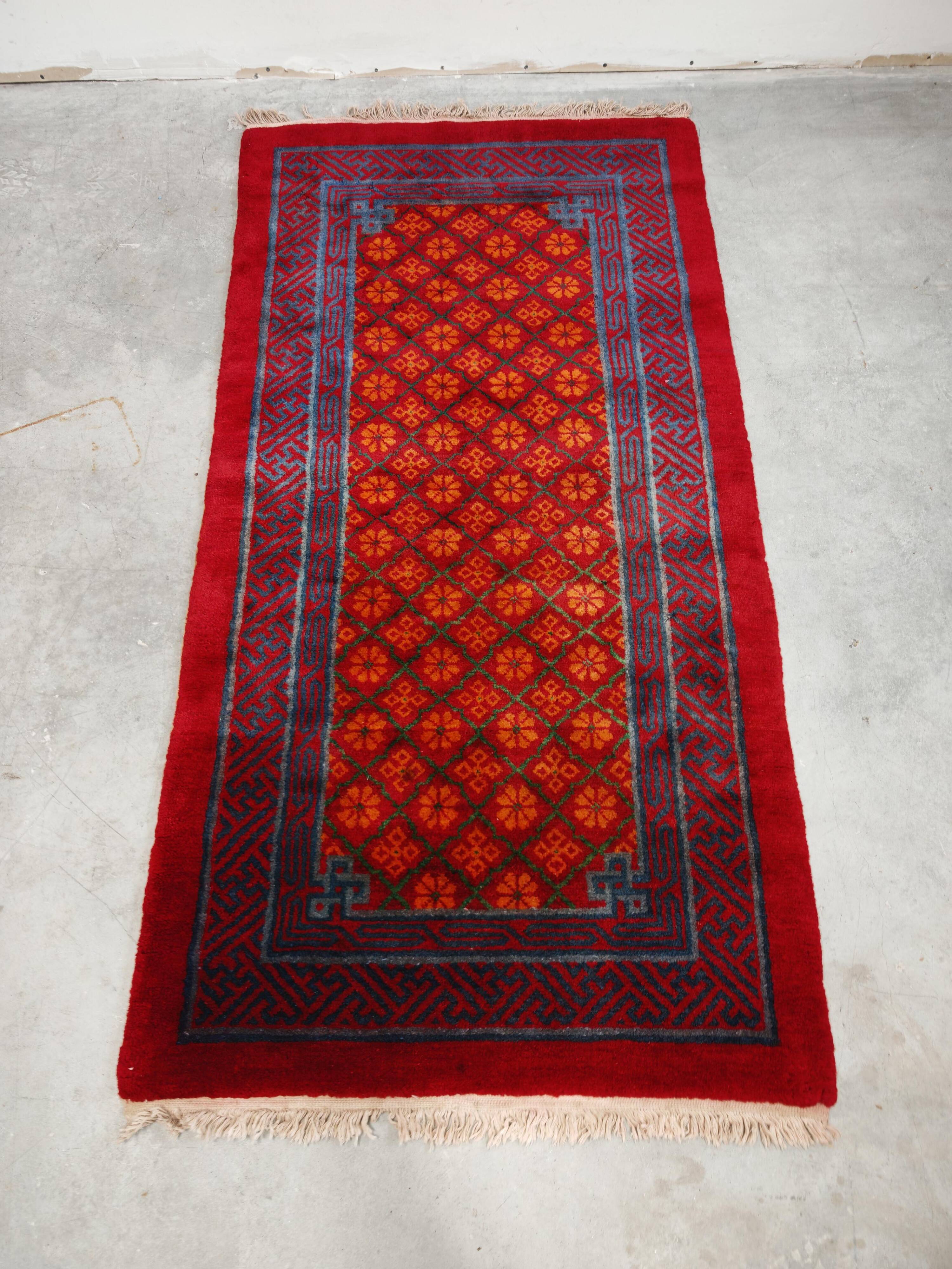 Ancient Khotan carpet, hand-knotted, floral pattern, Turkestan, 1960s.