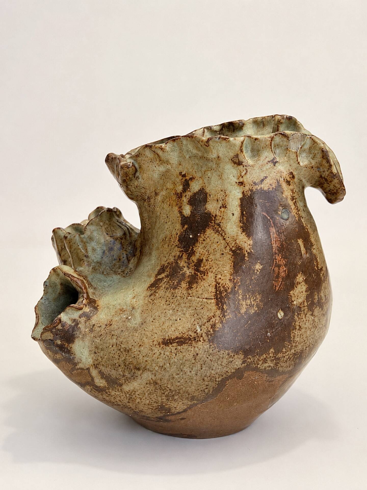 Sculptural vase in glazed stoneware, free form.