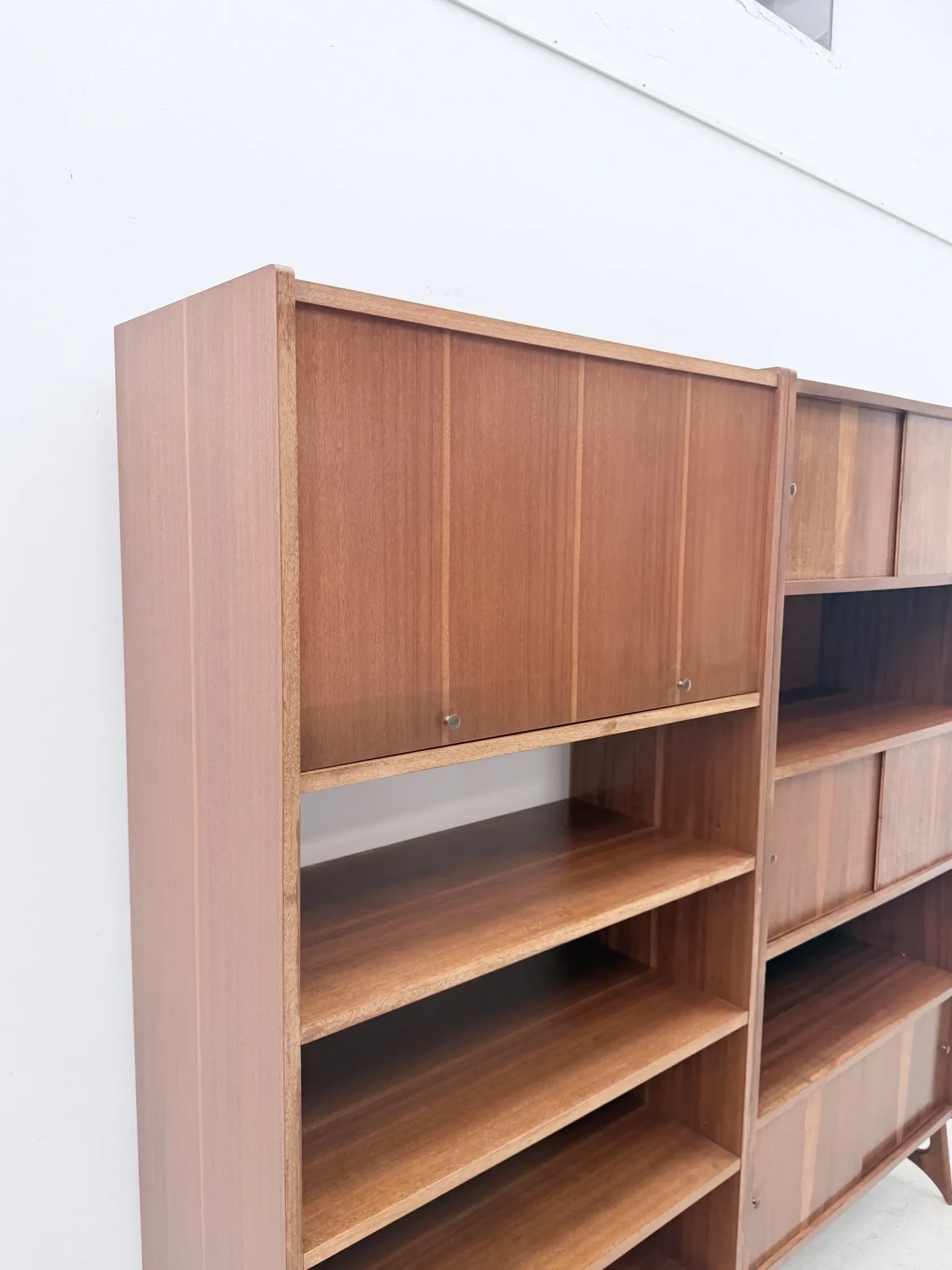 Scandinavian style bookshelf in teak and brass, 1950.