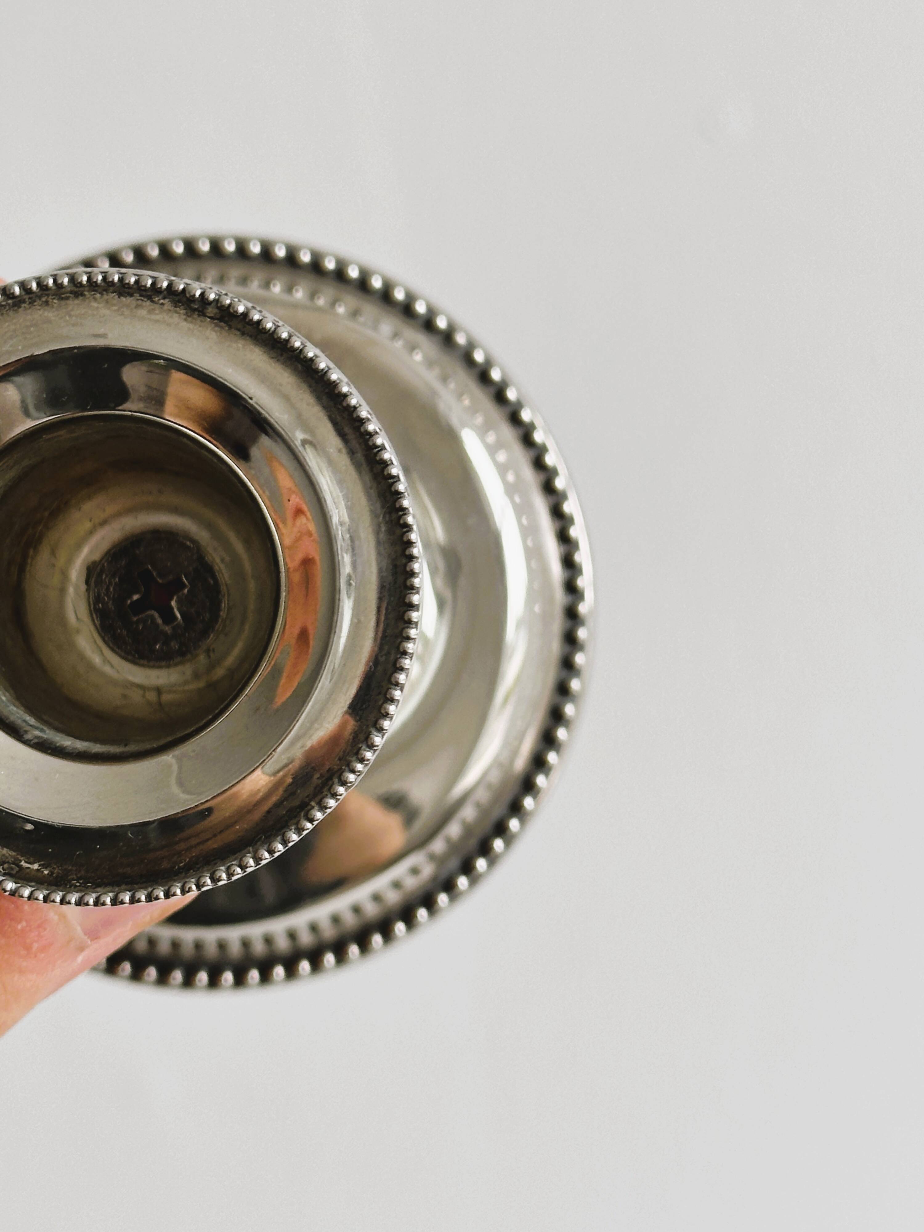 Small antique metal candle holder