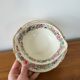 Limoges Bernardaud. Sauce boat in porcelain with floral decorations.