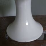 Cup on woven ceramic base with slip flowers