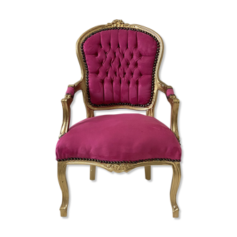 Fauteuil doré de style Louis XV