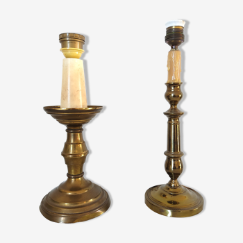 Two legs of antique candlestick and candlestick lamps