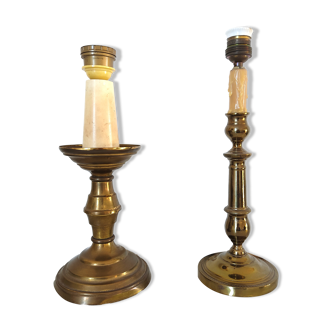 Two legs of antique candlestick and candlestick lamps