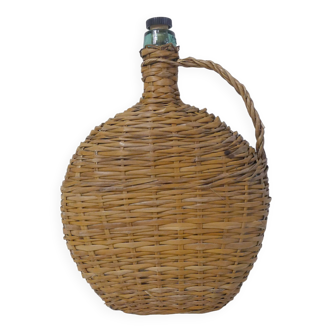 old bottle dressed in rattan vintage pilgrim gourd