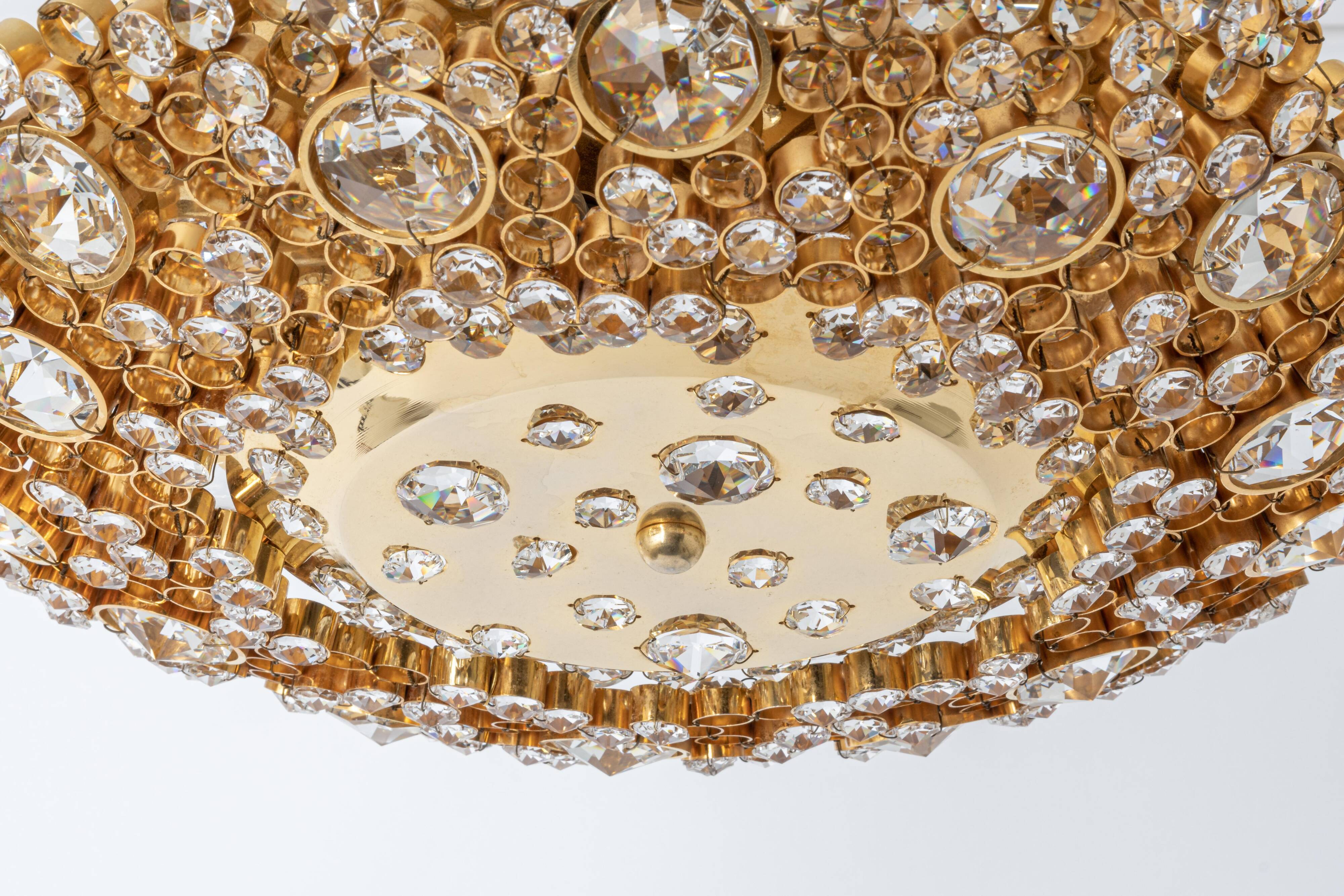 Floral wall light in gilded brass and cut glass by Palwa, Germany, 1970s.