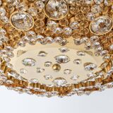 Floral wall light in gilded brass and cut glass by Palwa, Germany, 1970s.