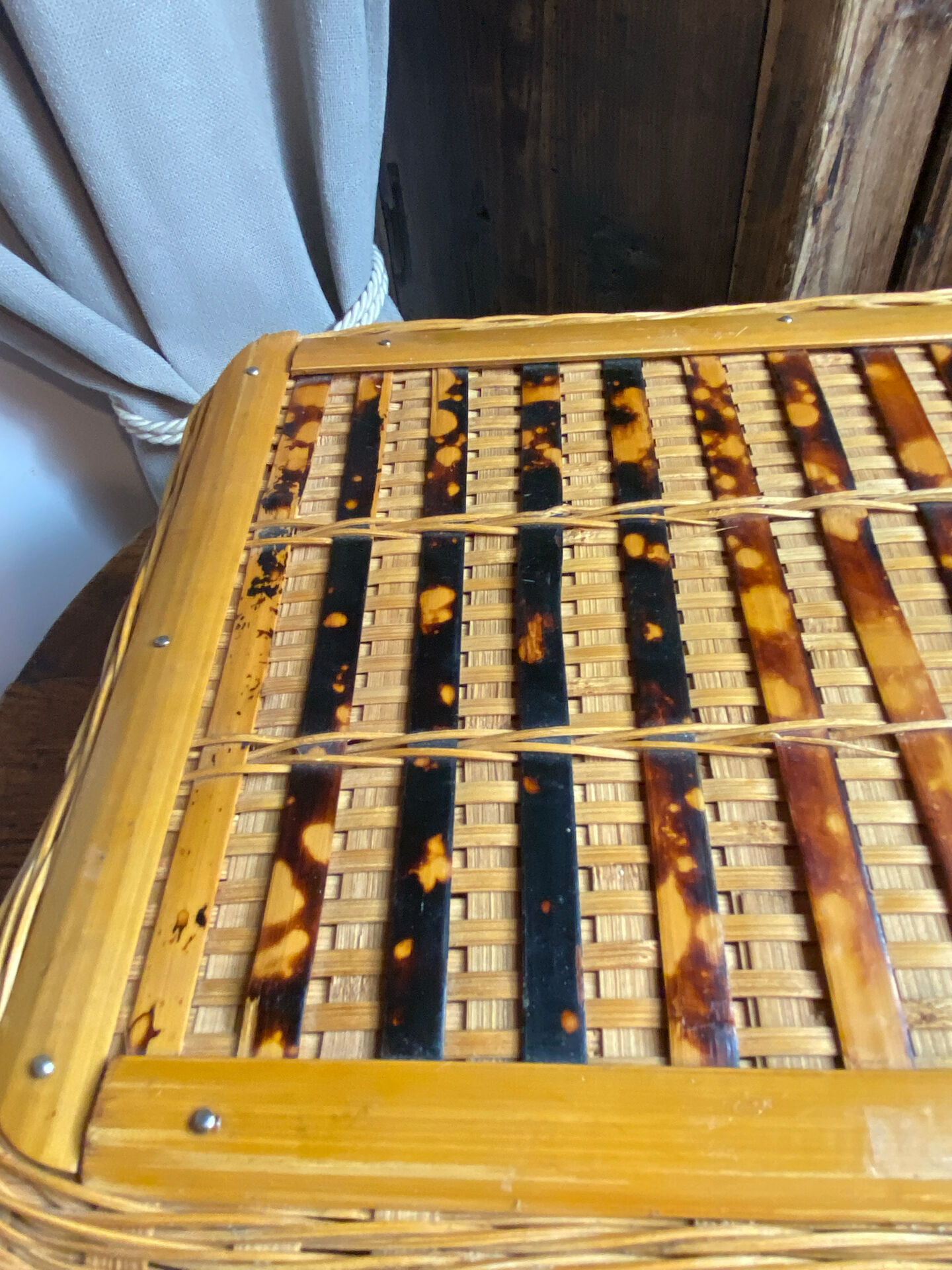 Wicker and wood suitcase