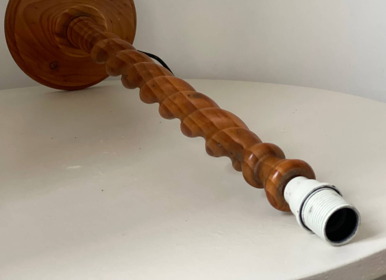 Turned wood lamp.
