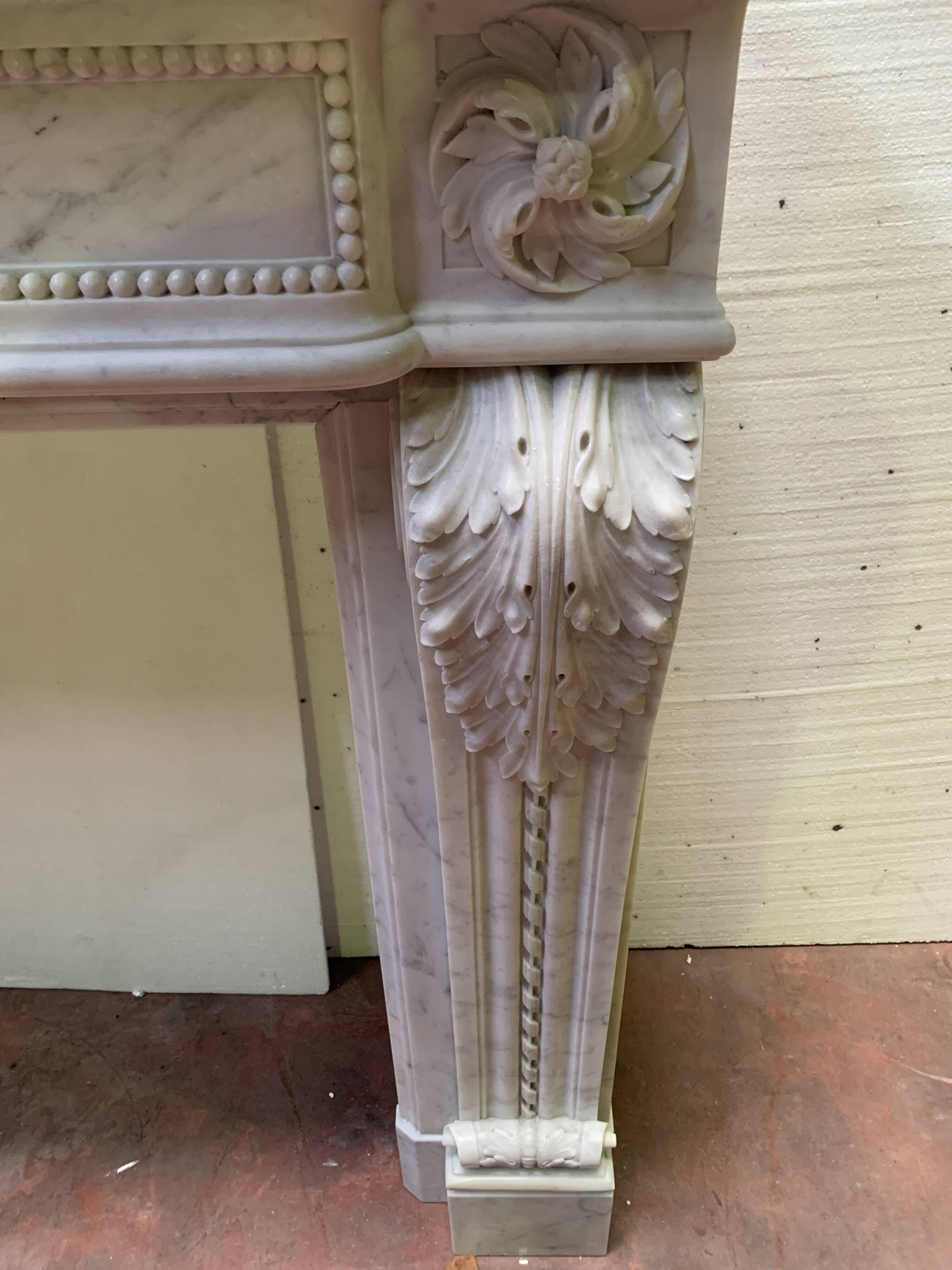 Louis XVI style fireplace in white Carrara marble, 19th century