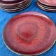 12 Assiettes en céramique sang de bœuf Chinoise des années 1950