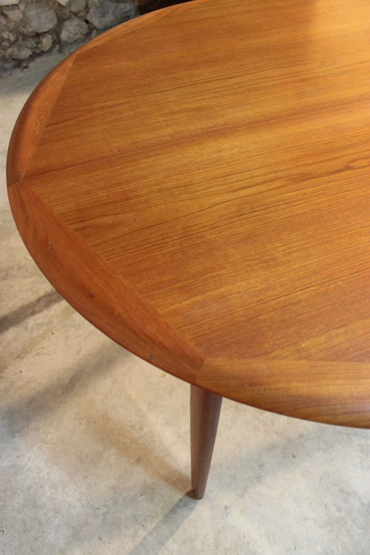Scandinavian vintage teak dining table with 2 extension cords hidden by Svend Aage Madsen for Knudsen - Son, Denmark