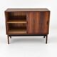 Low sideboard in rosewood with sliding doors. Denmark, 1960s