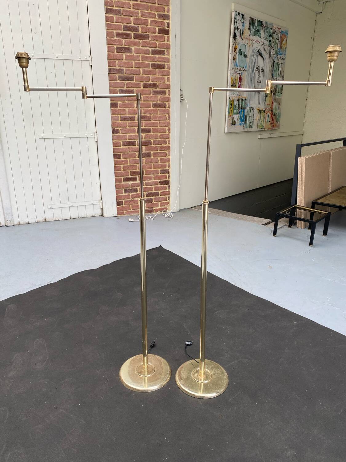 Pair of articulated floor lamps