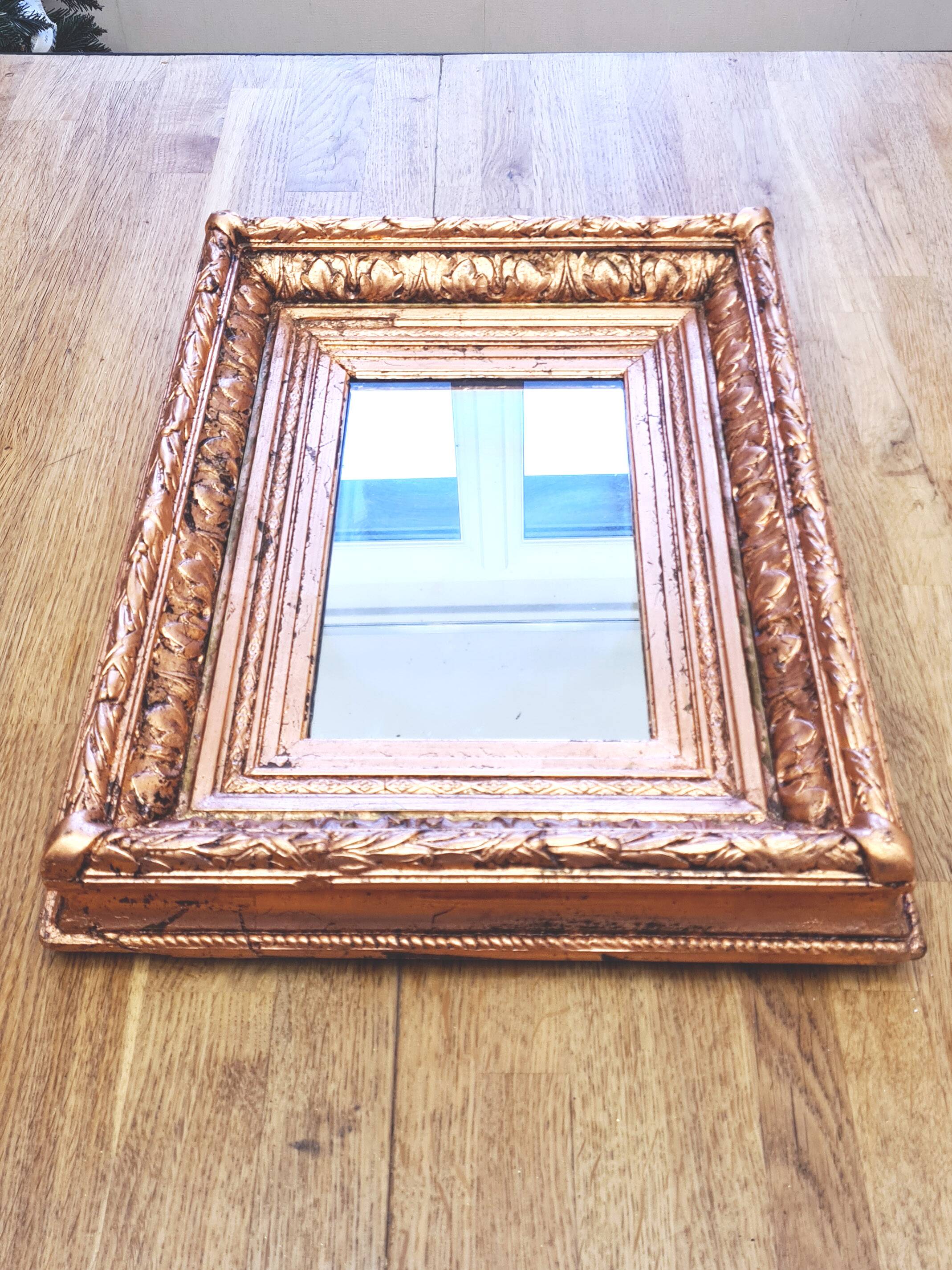 Napoleon III mirror, Wood and stucco, Gilded with copper leaf.