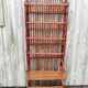 Rattan shelf/shelf carries magazines
