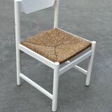 Vintage chair with wicker seat, minimalist design