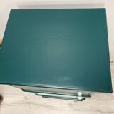 Two-door green bedside table