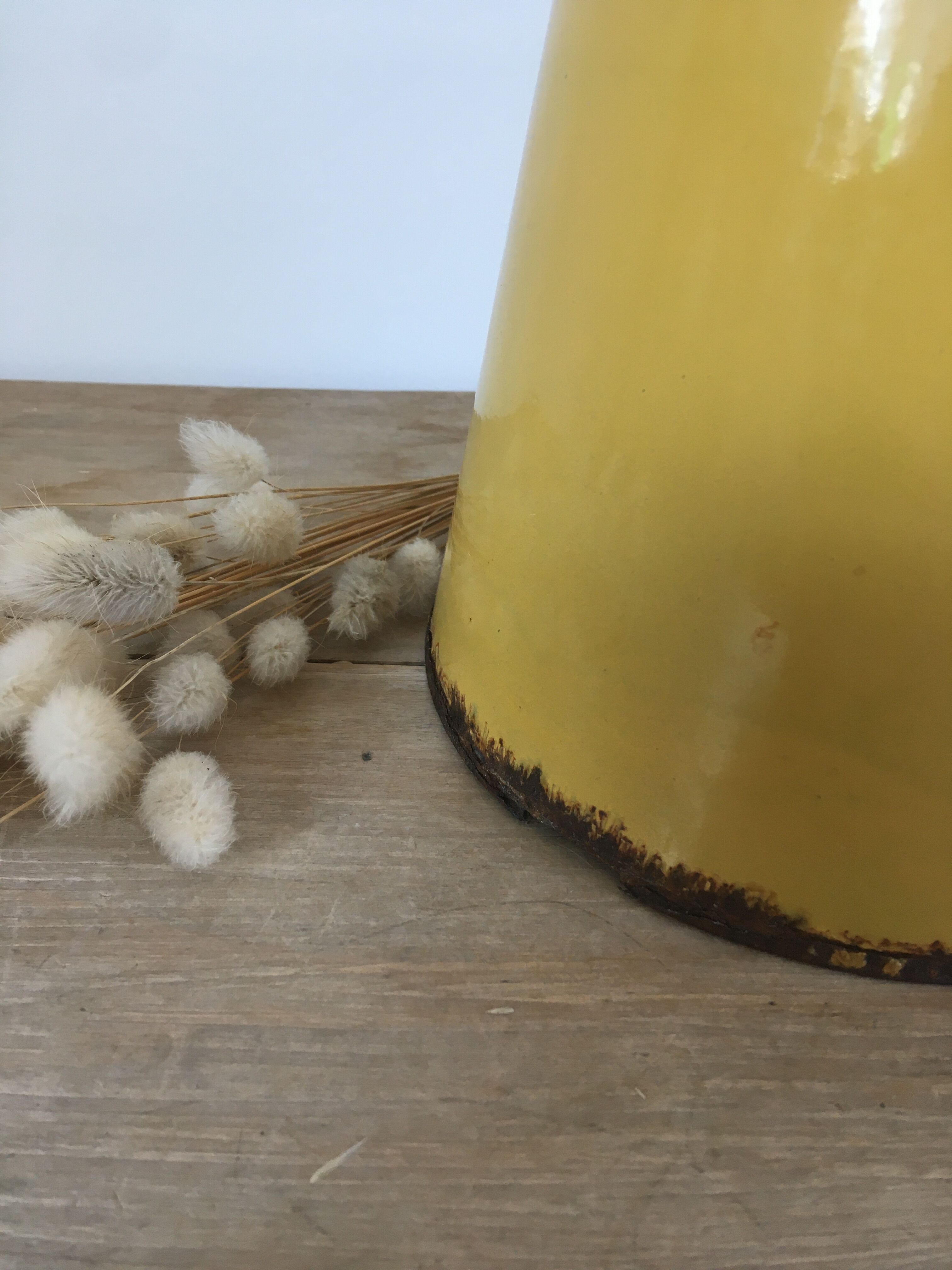 Mustard yellow enamelled sheet metal pitcher