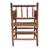 Antique Bobbin armchair with straw seat