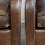2 fauteuils en cuir de mouton