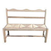 Wooden bench with vintage straw seating