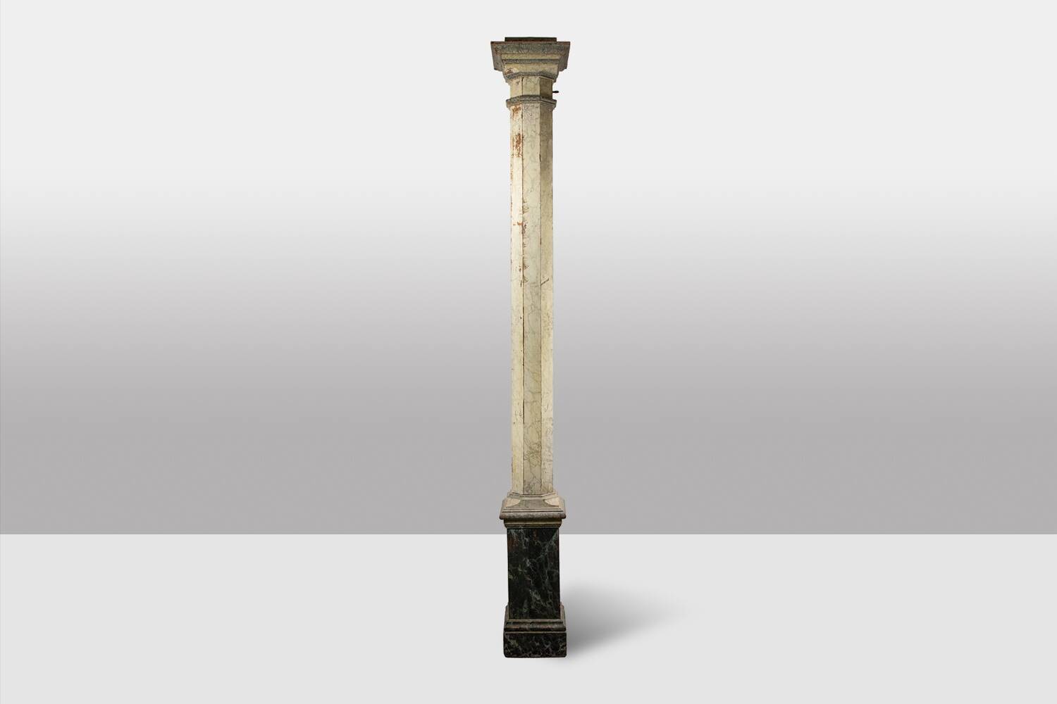 Pair of wooden columns painted to imitate marble. 1880s.