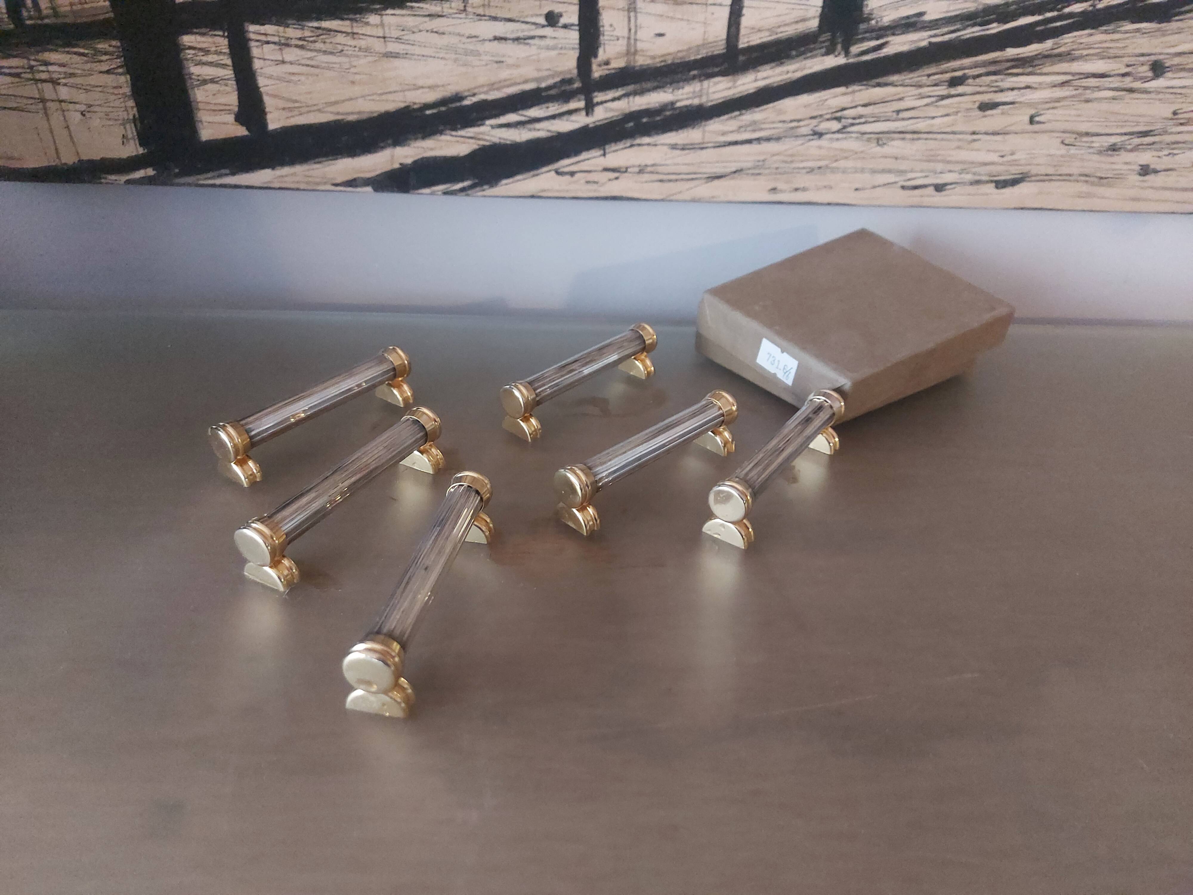 6 silver metal knife holders