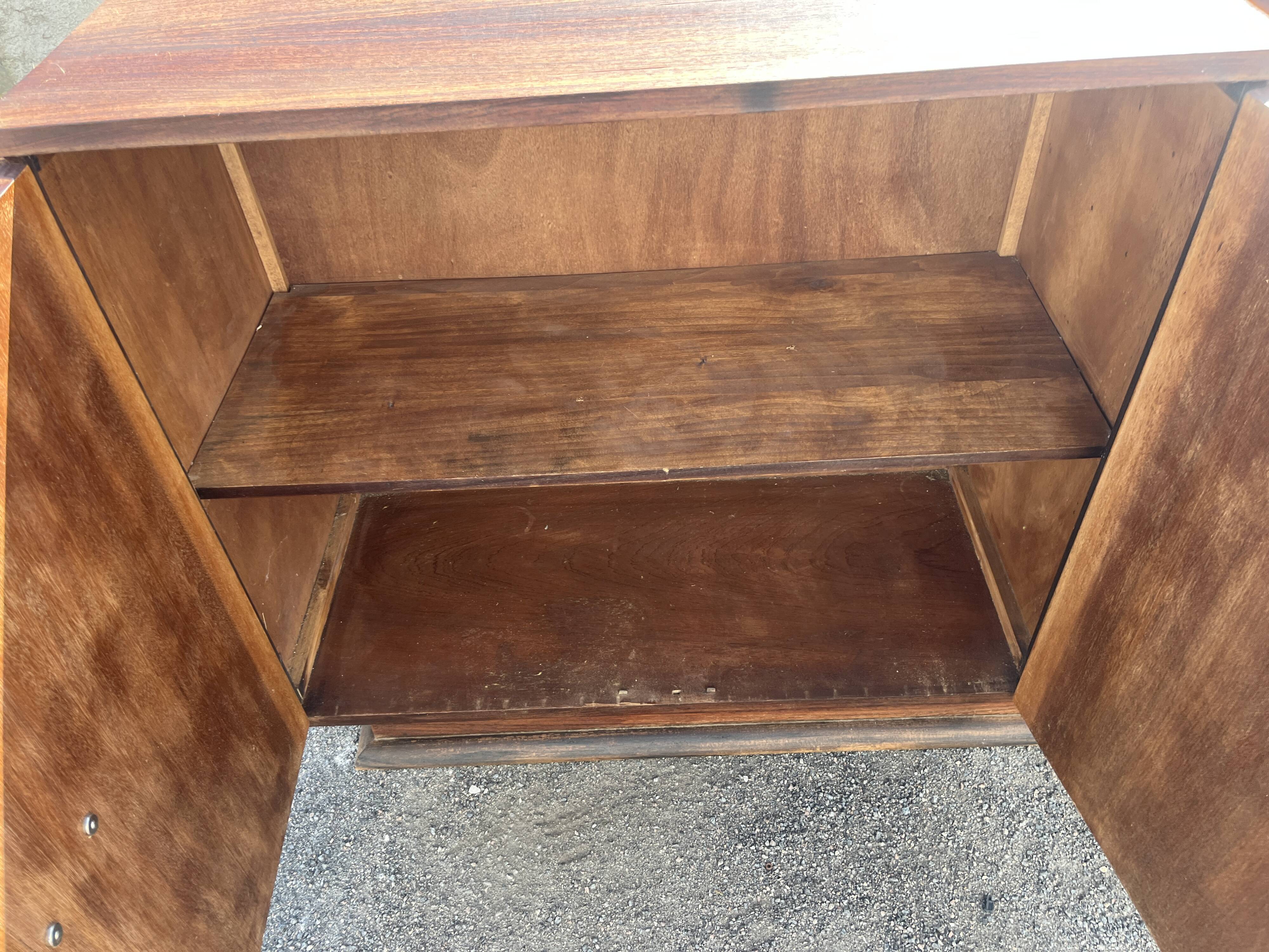 Asymmetrical antique Art Deco sideboard in rosewood veneer.