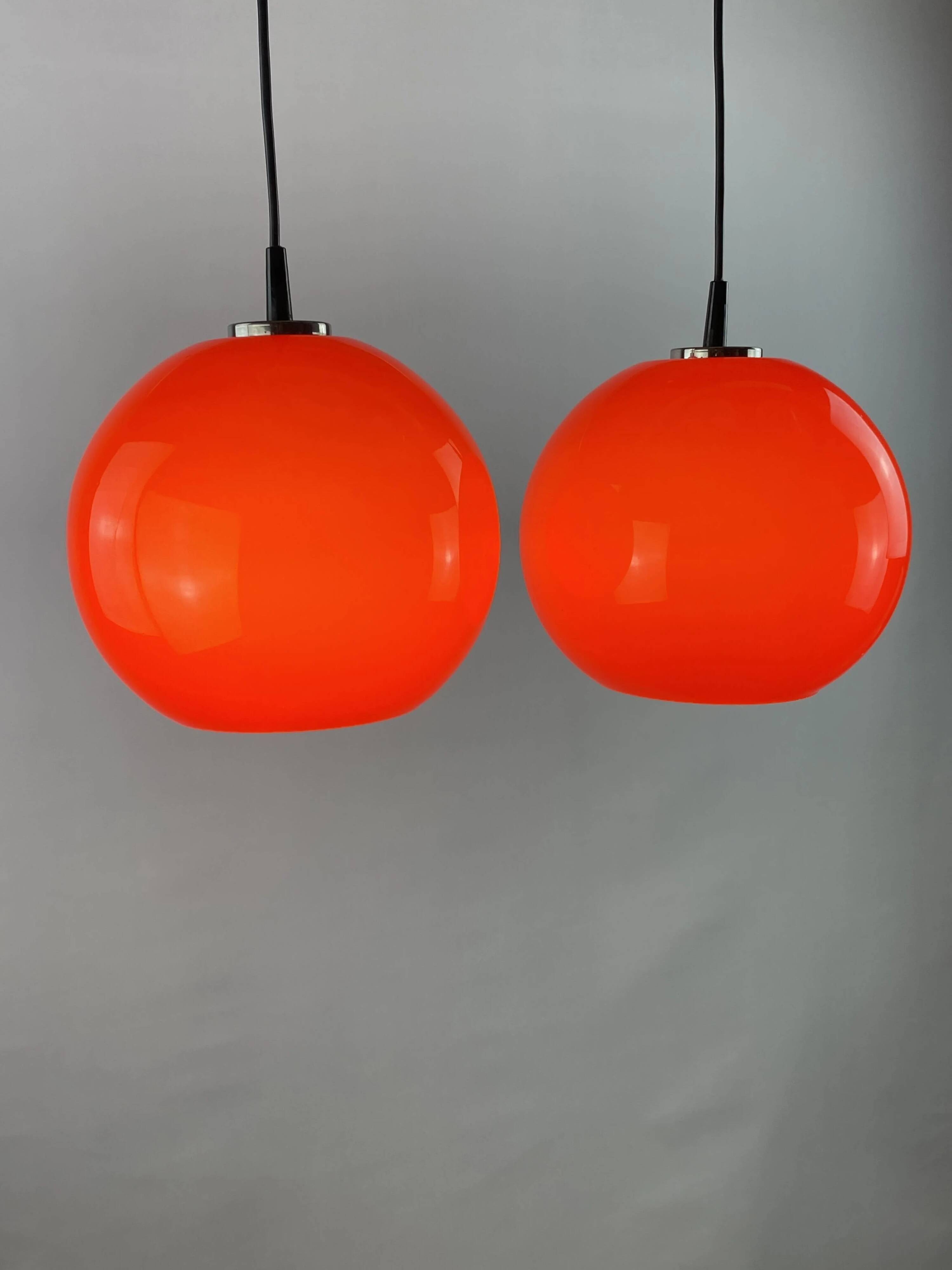 Pair of two cherry glass pendants by Peill & Putzler