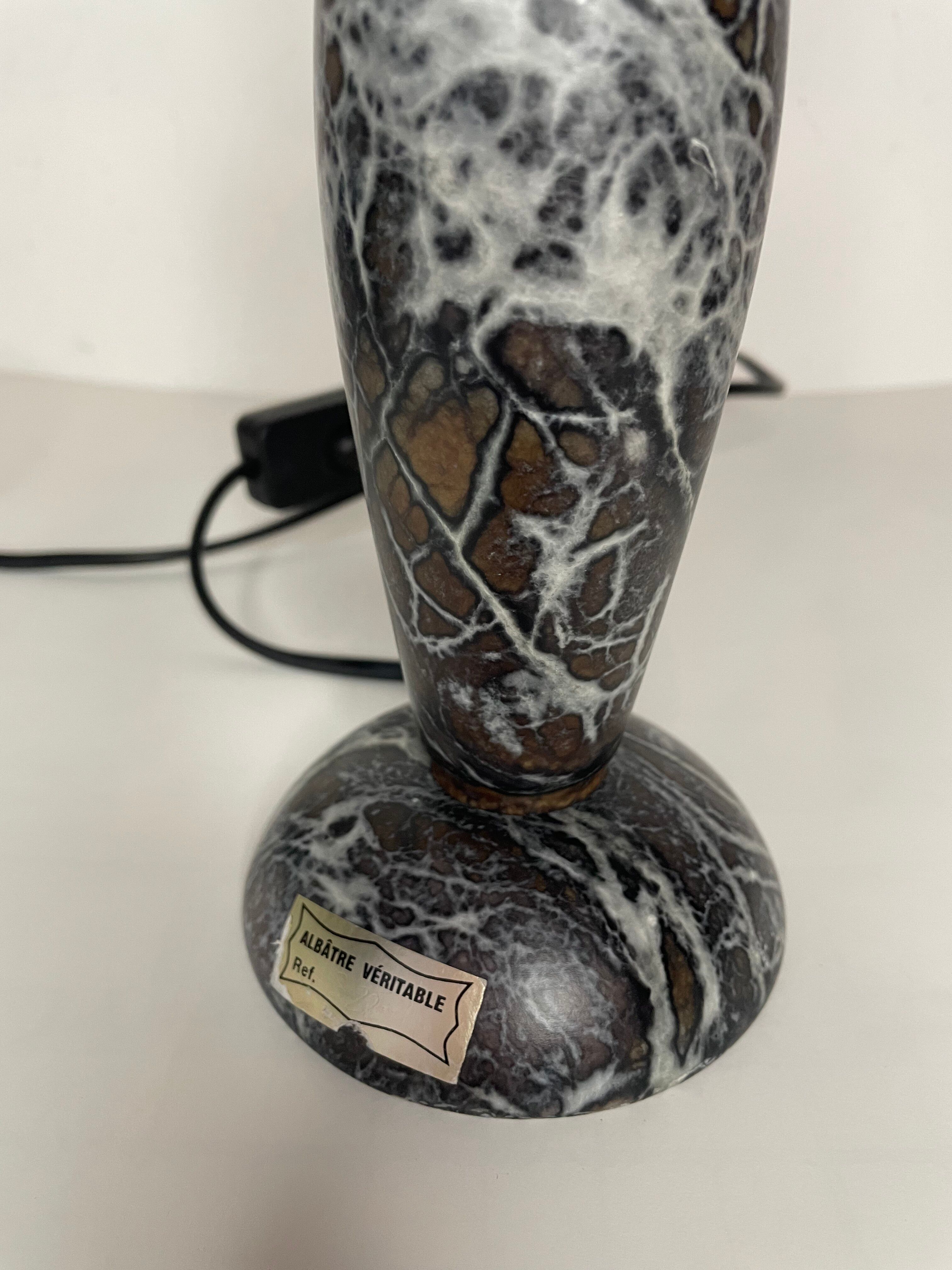 Alabaster foot of the lamp
