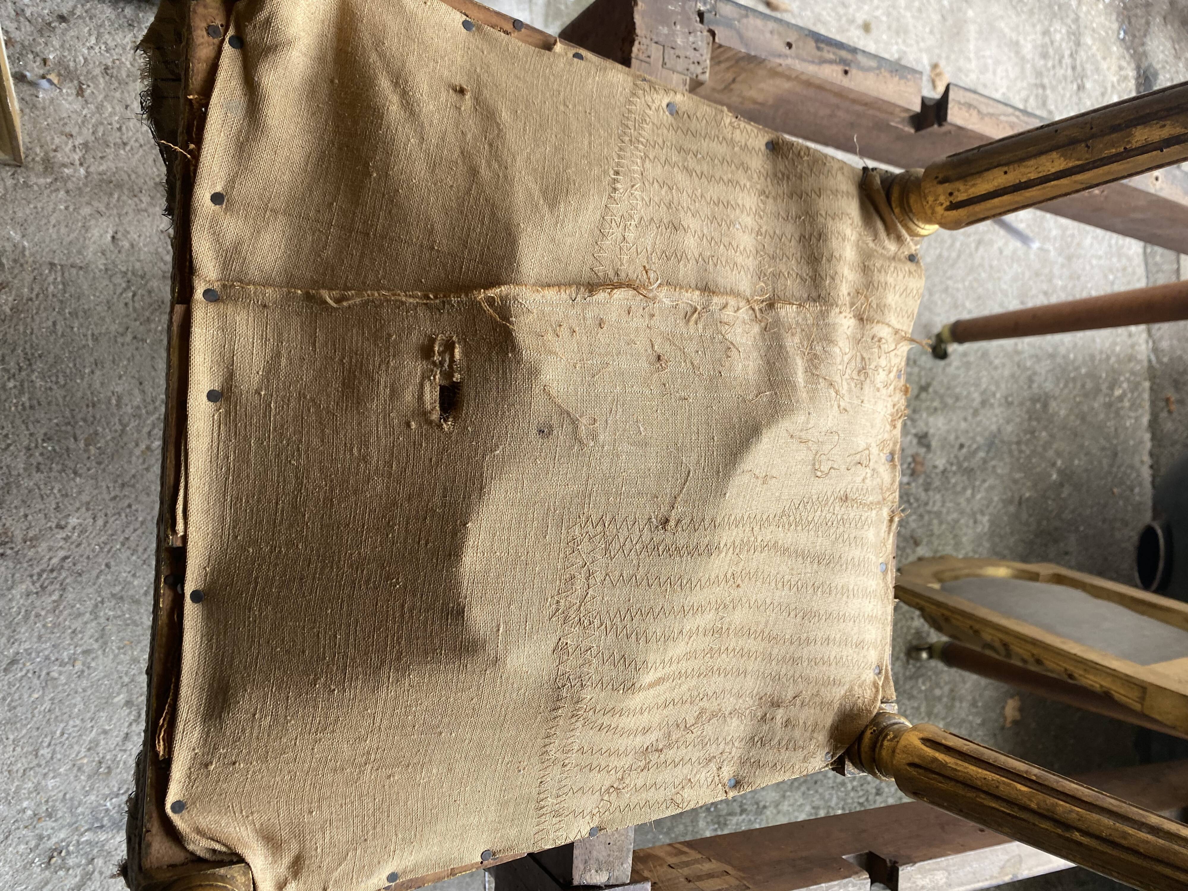 Louis XVI style living room in gilded wood. Napoleon III period