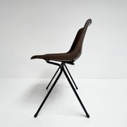 Brown and black set of 6 Polyprop chairs on a metal frame. The Polyprop cha