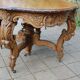 Napoleon III oak table with three extensions, 12 settings, late 19th century.