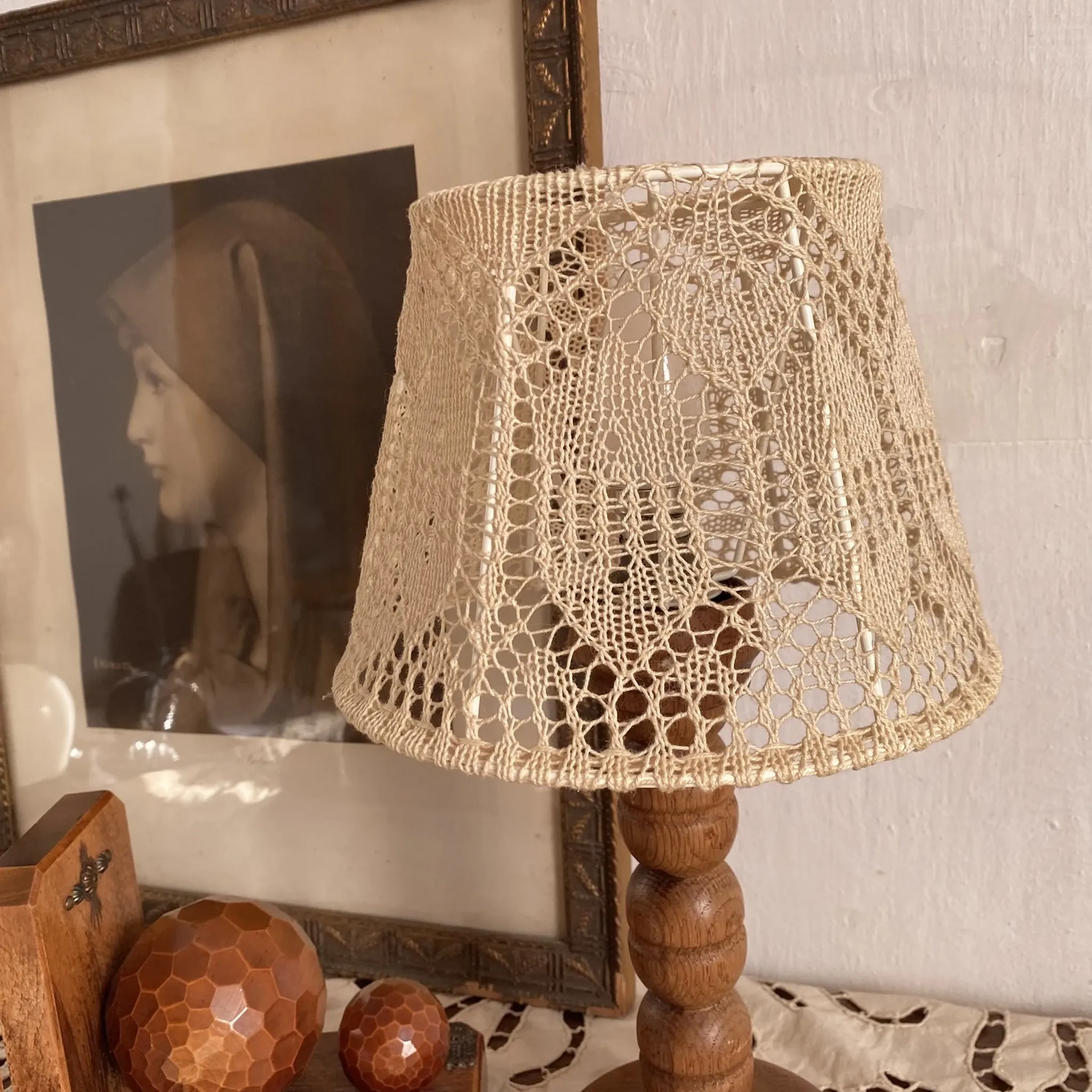 Wooden turned bedside lamp with lace