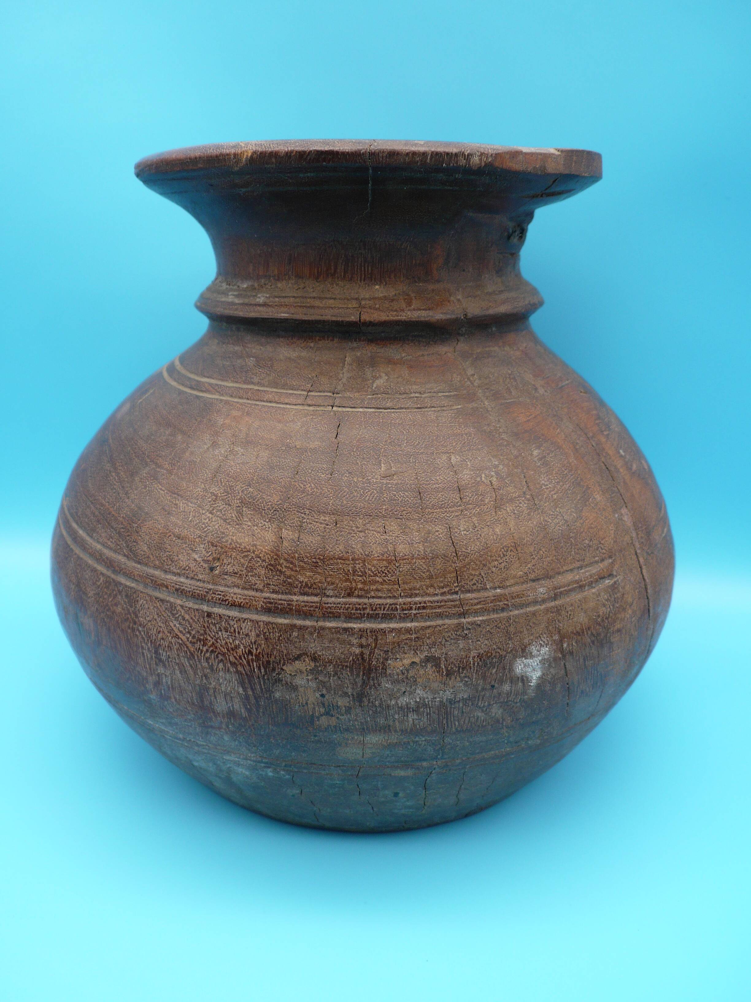 Large carved wooden pot / India