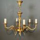 Bronze chandelier with ram's head motifs in the Louis XVI style, in the manner of Maison Jansen.