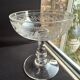 6 Baccarat champagne coupes with Greek engraving, slanted.