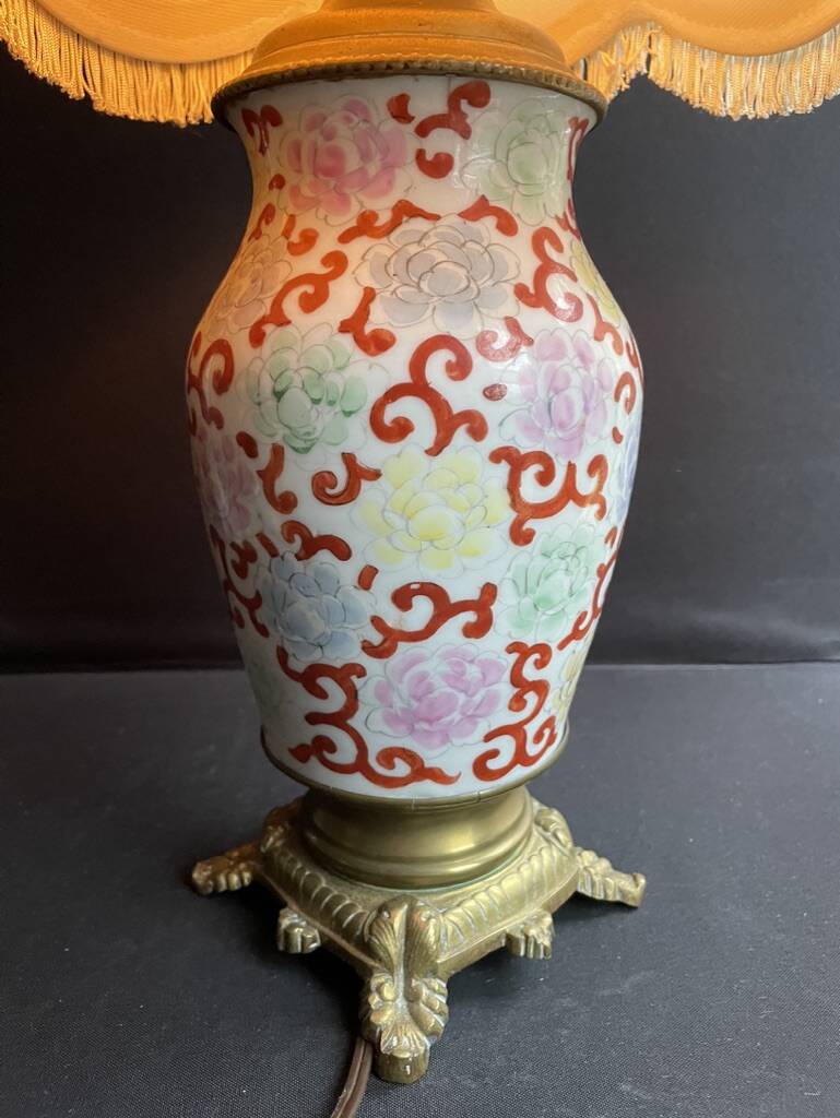 Old Asian vase mounted as a lamp with pagoda lampshade