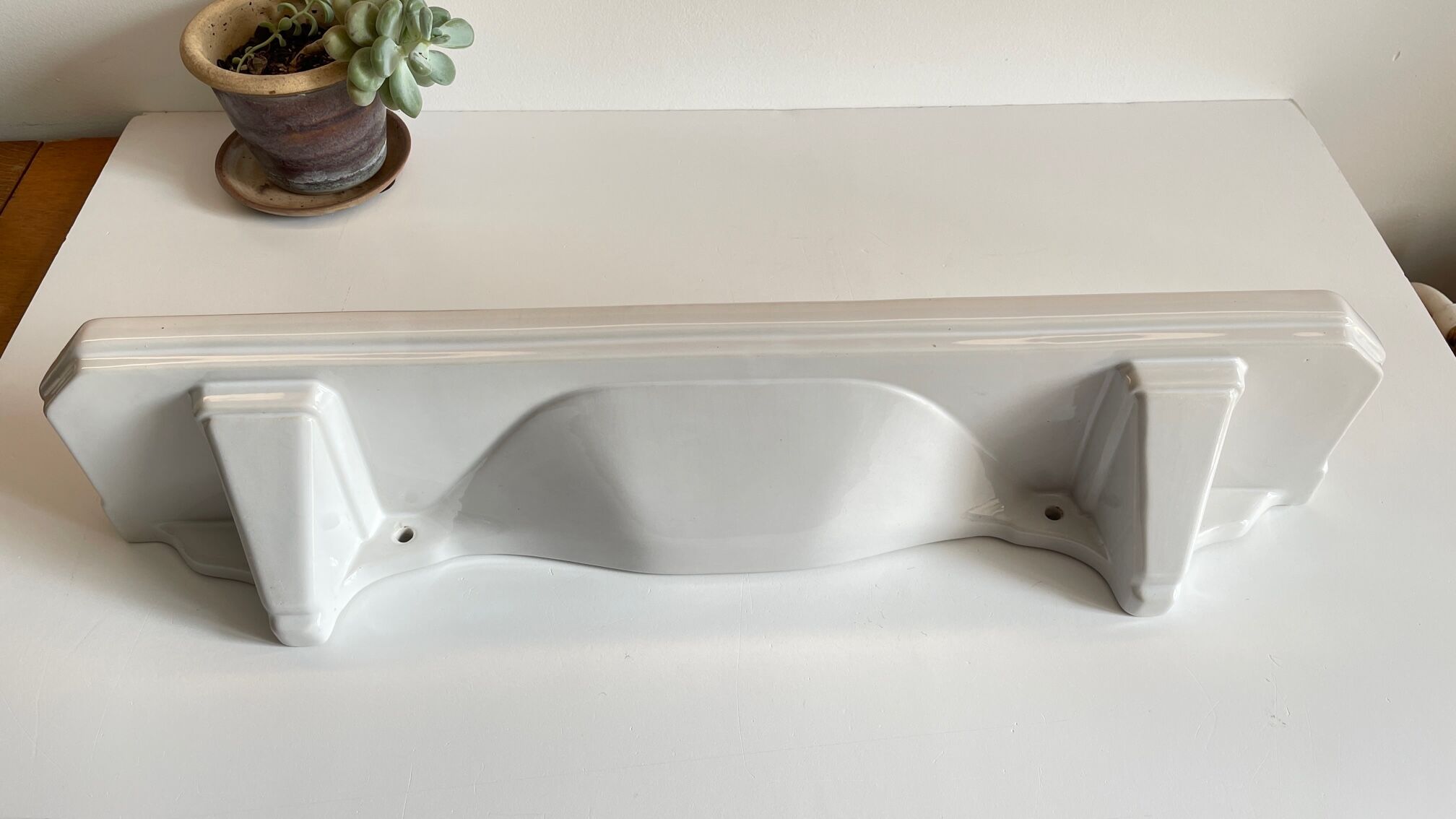 Vintage ceramic wall shelf