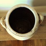 Terracotta pot with two vintage decorative handles