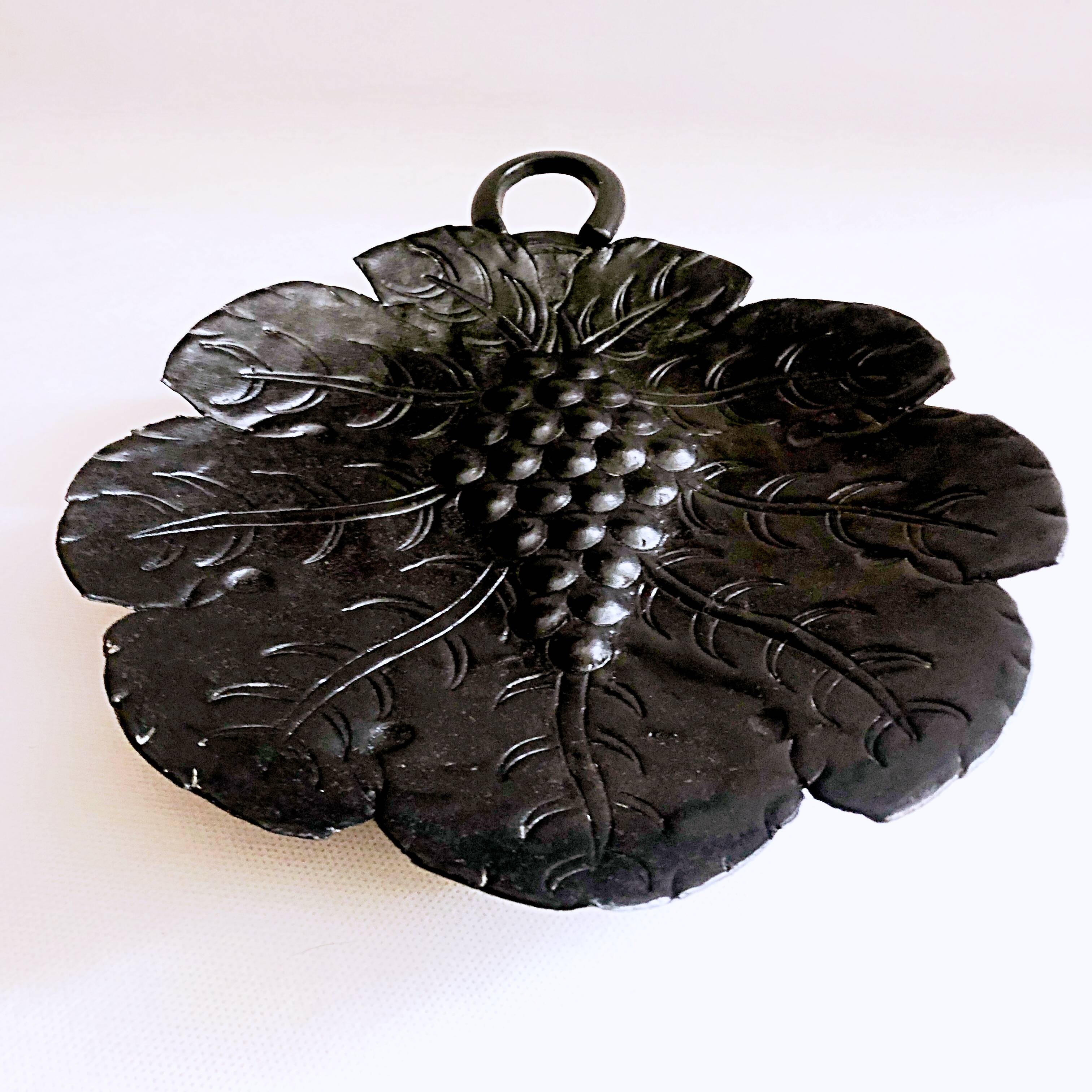 Artisanal embossed metal tripod dish