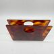 Lucite magazine rack "tortoiseshell", 1970s